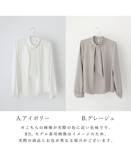 No need to tie it. Just put it on and you're done! Bowtie blouse