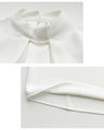No need to tie it. Just put it on and you're done! Bowtie blouse