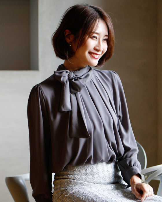 The trend continues! A stylish and elegant ribbon bowtie blouse