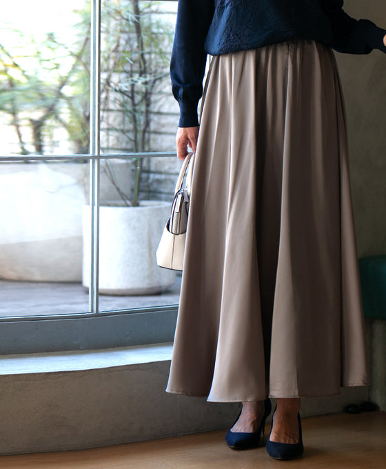 For a classy look. Don't just go for casual! Satin tuck skirt