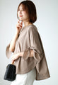 A ribbon sleeve blouse that will be the centerpiece for both work and casual occasions