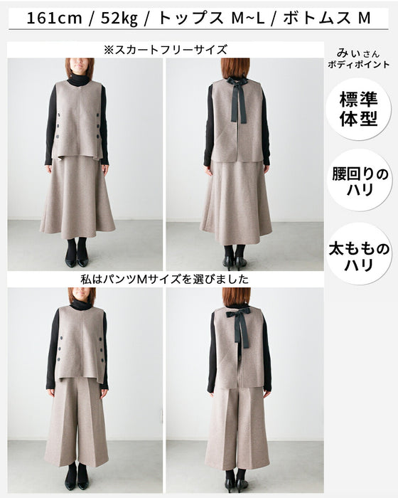 A lovely feminine look! Back ribbon vest + three-dimensional skirt 2-piece set