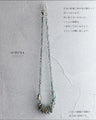 Ring necklace that changes with light