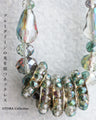 Ring necklace that changes with light