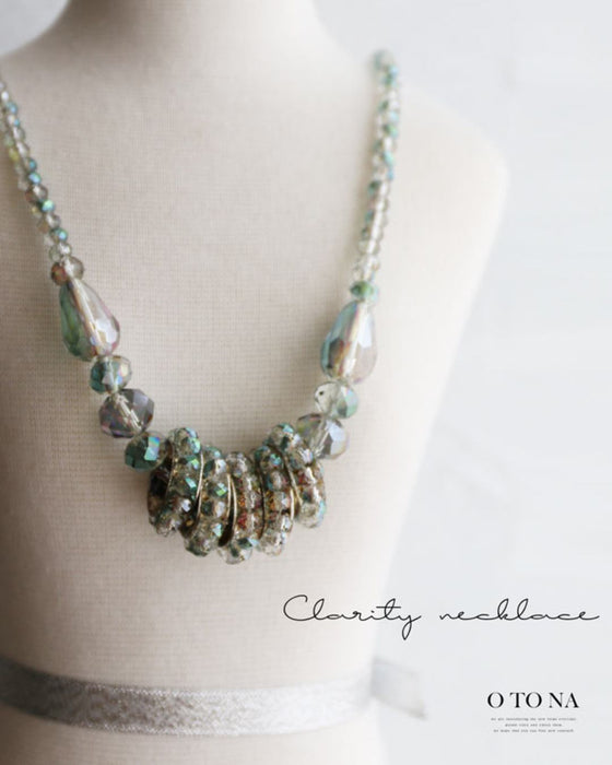 Ring necklace that changes with light
