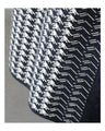 A knit with a modern pattern and a sparkling elegance.