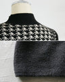 A knit with a modern pattern and a sparkling elegance.