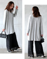 A layered-style dress tunic with flowing drapes.