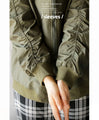 How far does it stick together? Different material blouson