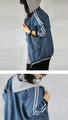 Denim blouson with lines