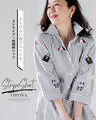 A casual and playful look. Striped and embroidered shirt. 