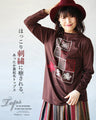 Warm fleece-lined top with a heartwarming embroidery.