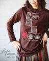 Warm fleece-lined top with a heartwarming embroidery.