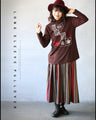 Warm fleece-lined top with a heartwarming embroidery.