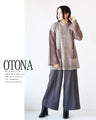 OTONA original. Makes every move feminine. A cozy knit top made of luxurious lace in beige