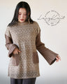 OTONA original. Makes every move feminine. A cozy knit top made of luxurious lace in beige