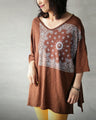 A loose, casual paisley T-shirt that's all about ennui
