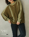 A stylish combination of knit and lines. Knit tops