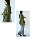 Super comfortable! A ribbed A-line tunic with a turtleneck that you'll want to wear every day