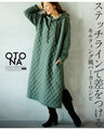 A quilted-style parka dress with distinctive stitching lines