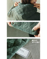 A quilted-style parka dress with distinctive stitching lines