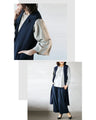 A knit long vest that will make you look sharp just by adding it