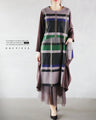 A collaboration dress with a check pattern and a unique design that stands out from the crowd