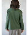 Adults will be in high spirits too! Enjoy the daily wear of this mixed-material top in green