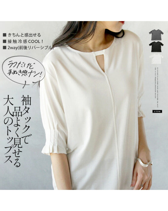 A sophisticated adult top with tucked sleeves