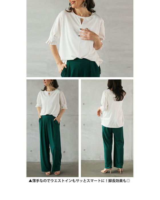 A sophisticated adult top with tucked sleeves