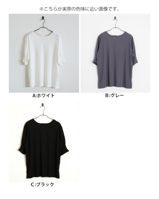 A sophisticated adult top with tucked sleeves