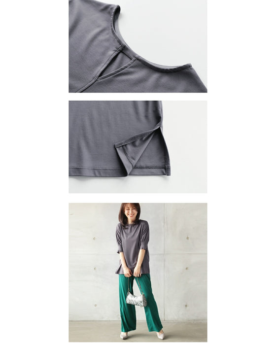 A sophisticated adult top with tucked sleeves