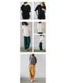 A sophisticated adult top with tucked sleeves