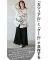 A sheer shirt top with a cool and casual bold logo