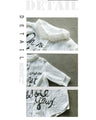 A sheer shirt top with a cool and casual bold logo