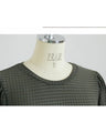 A top with a textured surface that adults will love for its simple yet distinctive look