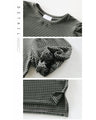 A top with a textured surface that adults will love for its simple yet distinctive look