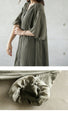A one-piece dress with long, fluffy sleeves that can be worn in many different ways
