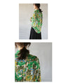 A gorgeous green floral shirt with a bold pattern