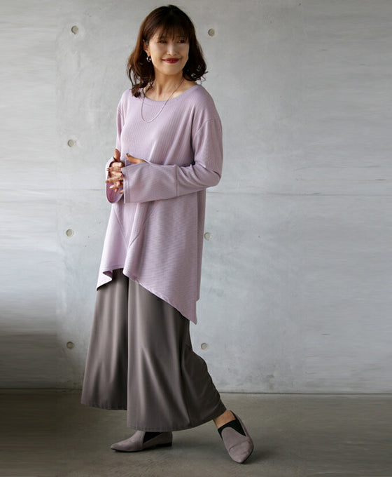 A long top that can be worn in many different ways to hide and show off