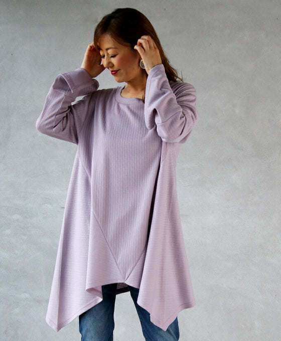 A long top that can be worn in many different ways to hide and show off