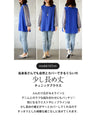 A tunic blouse with sheer striped sleeves that stands out from the crowd