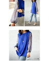 A tunic blouse with sheer striped sleeves that stands out from the crowd