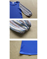 A tunic blouse with sheer striped sleeves that stands out from the crowd