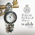 Antique blue watch on hand