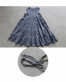 A tiered dress in subtle colors that will make adults' hearts flutter