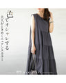 A tiered dress in subtle colors that will make adults' hearts flutter