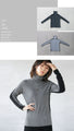 A versatile knit that can be worn both front and back for a slimming look