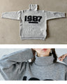 I fell in love with the fluffy logo made of boa.