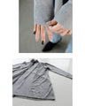 A knit cardigan with a casual yet elegant look, studded with jewels